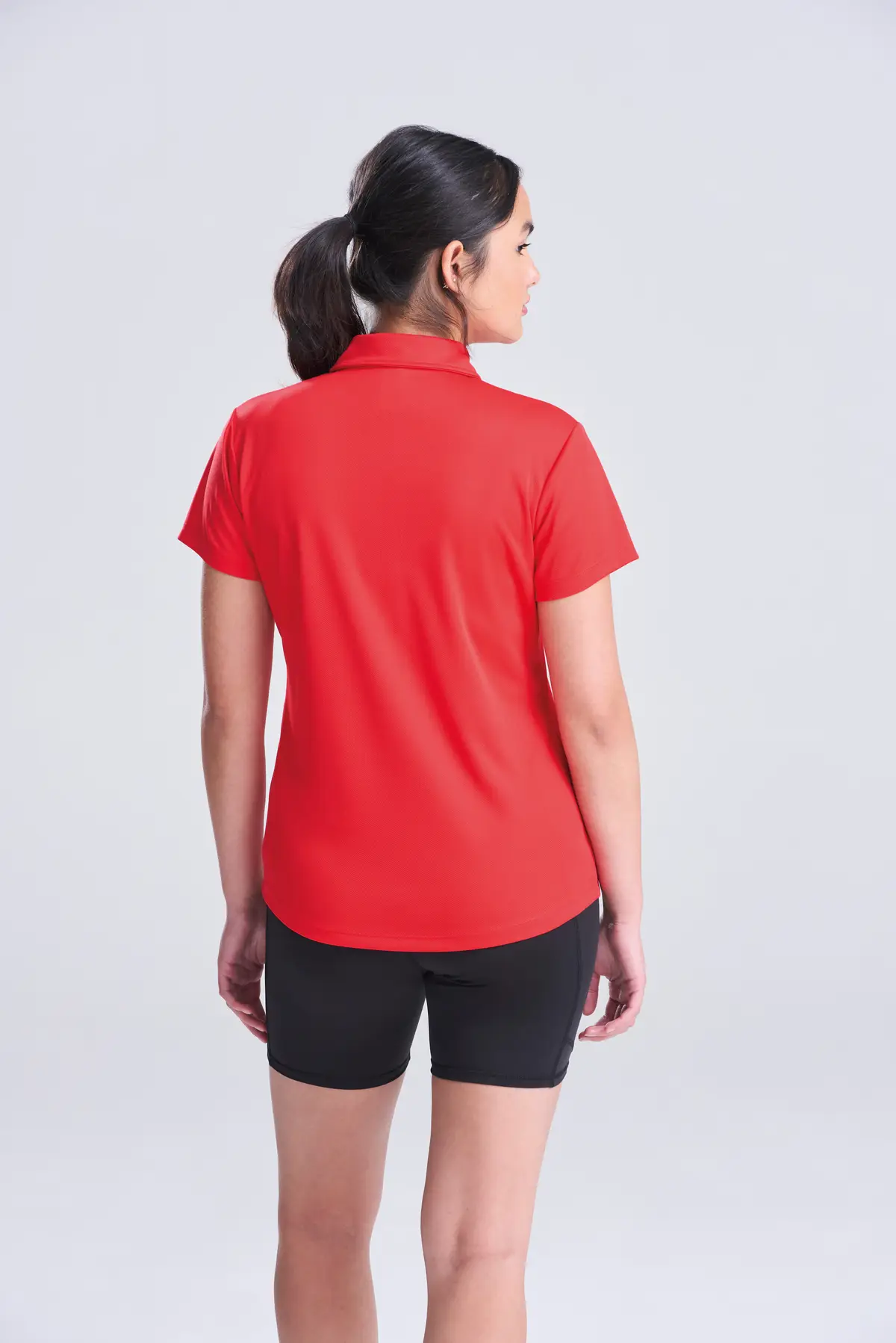 AWDis Just Cool Women's cool polo – Fire Red – Original on-model photograph 04