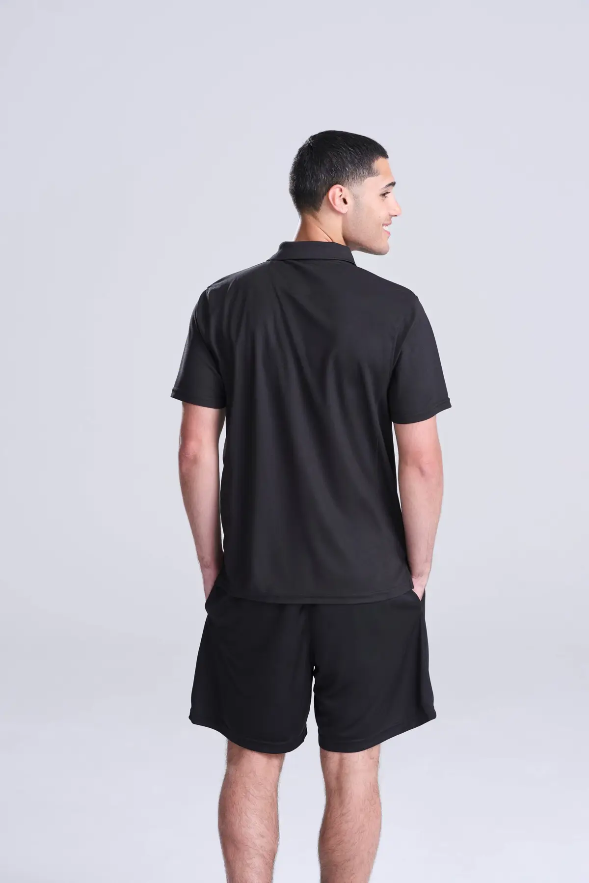 AWDis Just Cool SuperCool performance polo – Jet Black – AWDis original on-model photograph