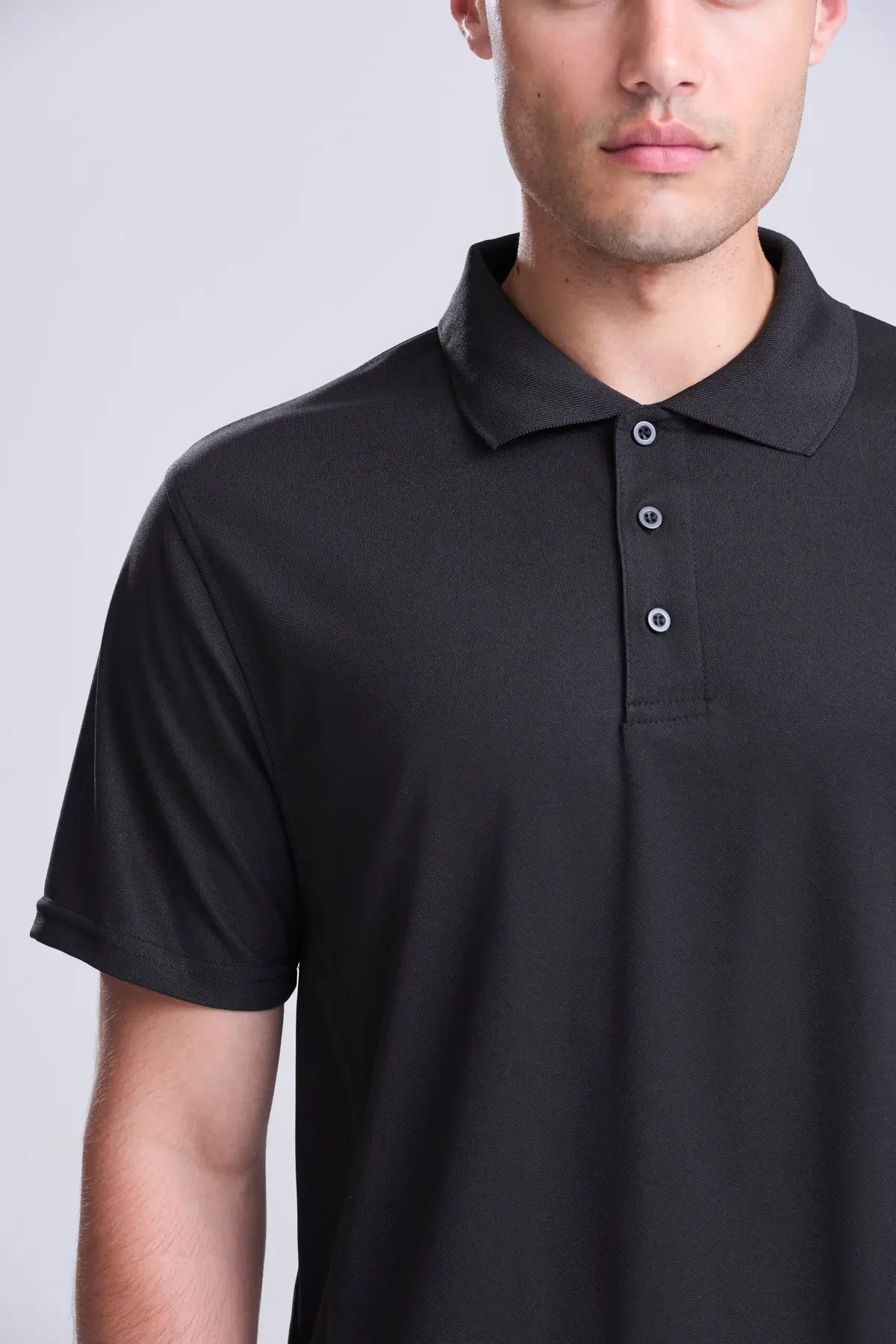 AWDis Just Cool SuperCool performance polo – Jet Black – AWDis original on-model photograph