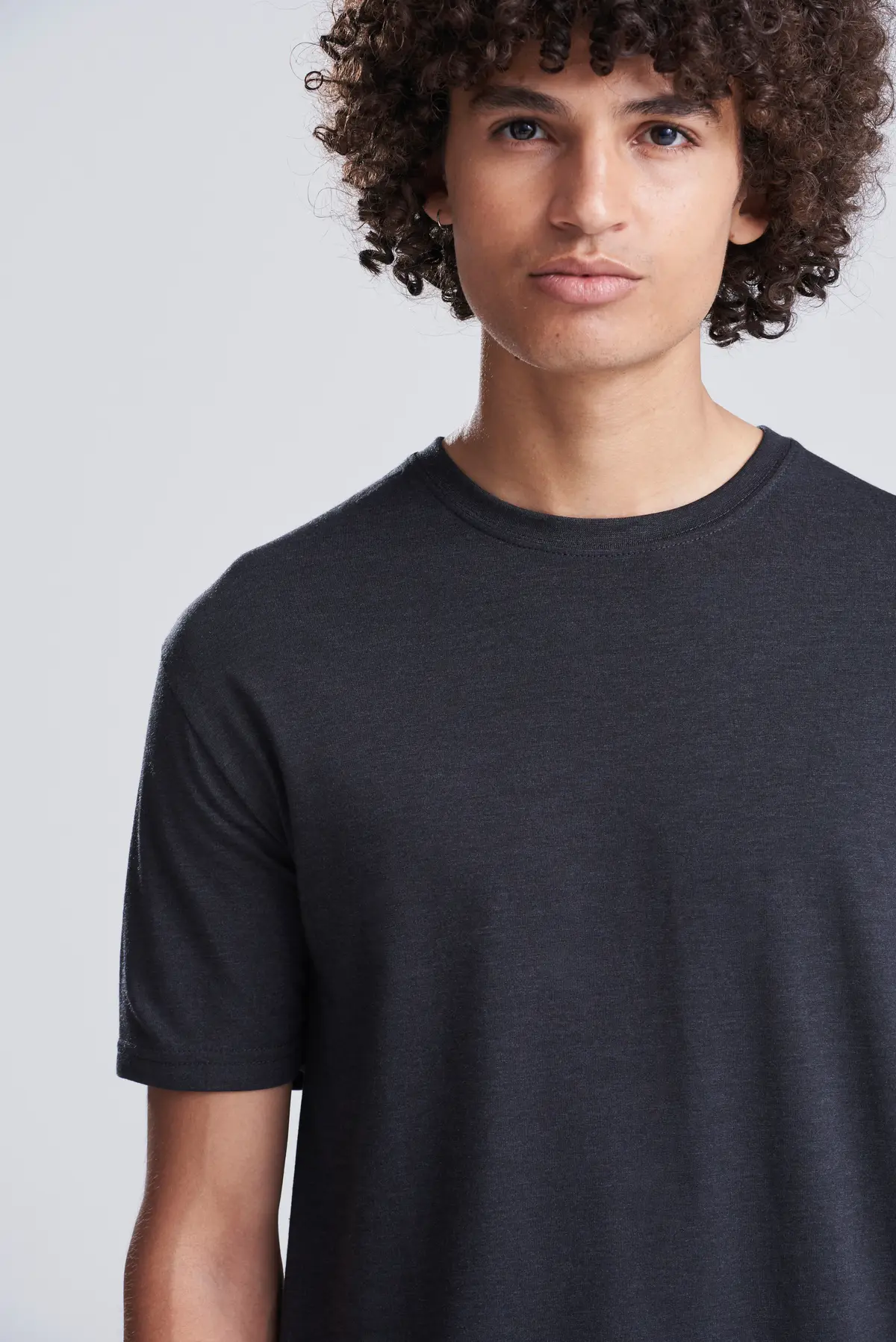 AWDis Just T's Triblend T – Heather Black – Original on-model photograph 40