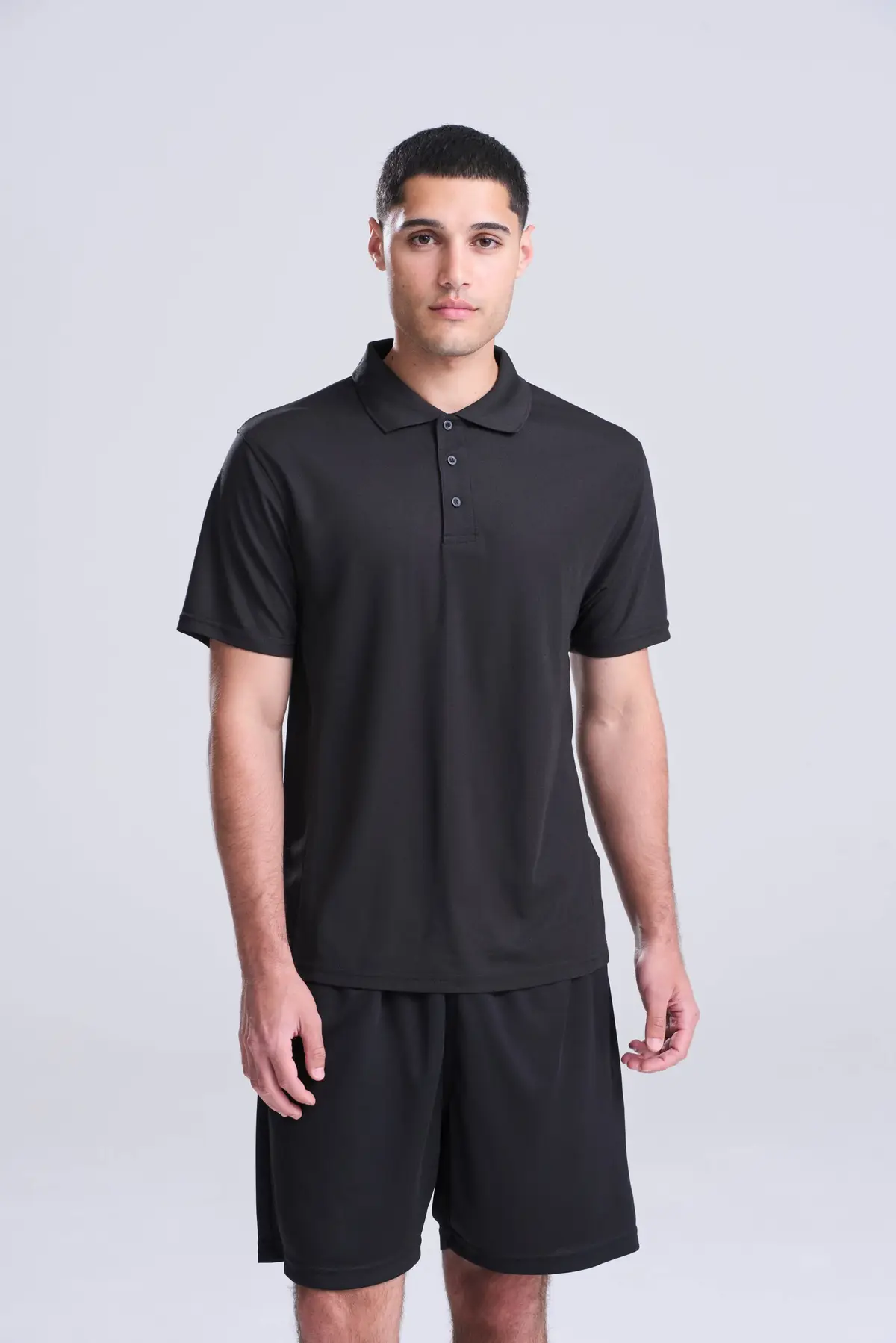 AWDis Just Cool SuperCool performance polo – Jet Black – AWDis original on-model photograph