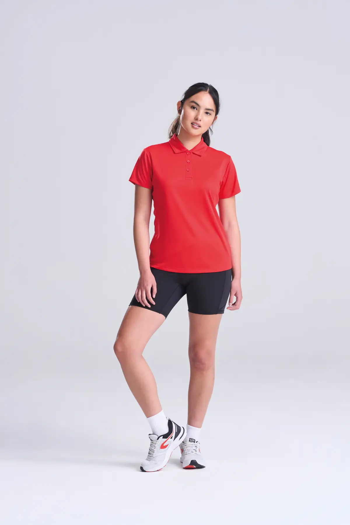AWDis Just Cool Women's cool polo – Fire Red – Original on-model photograph 01