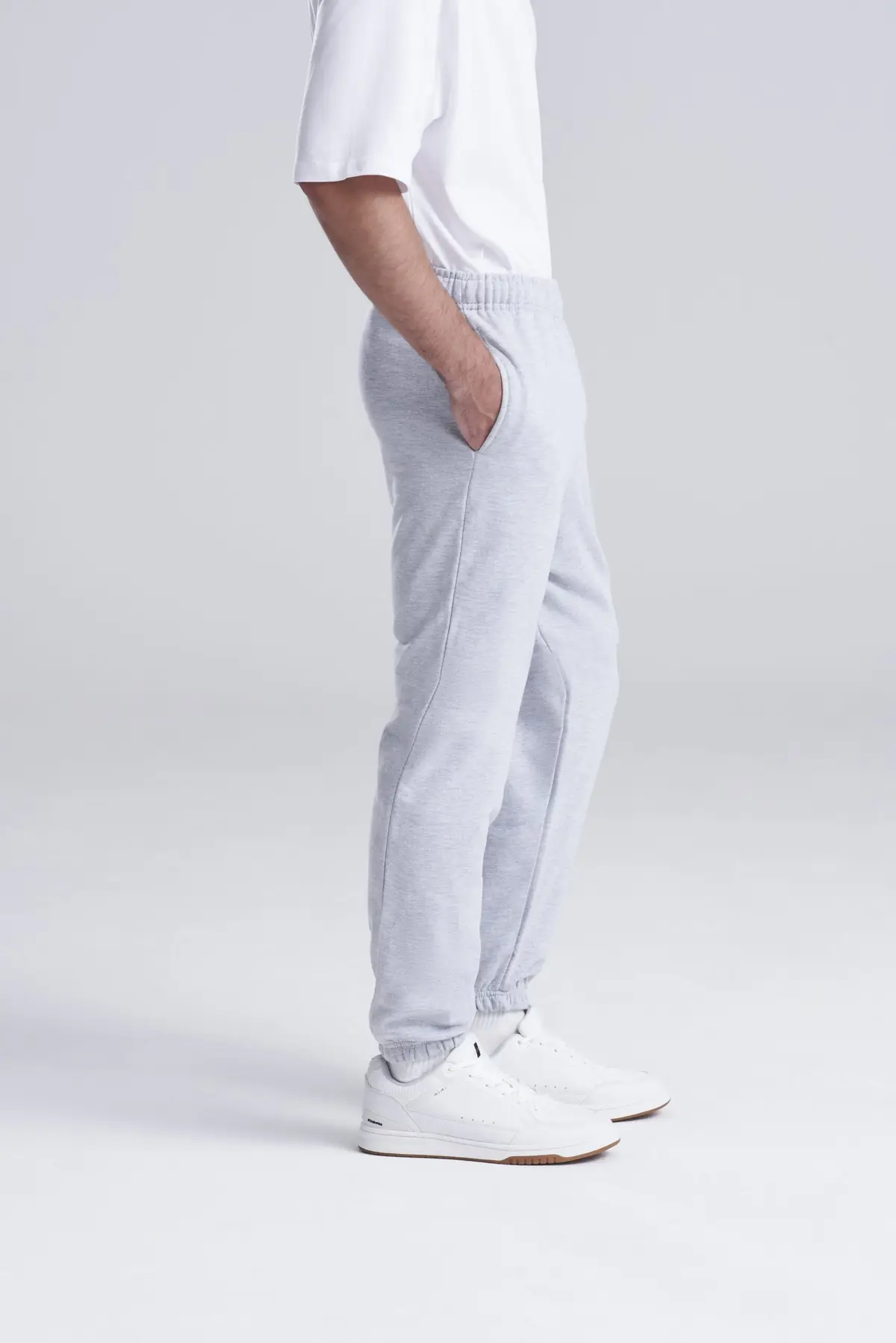 AWDis Just Hoods College cuffed sweatpants – Heather Grey – AWDis original on-model photograph