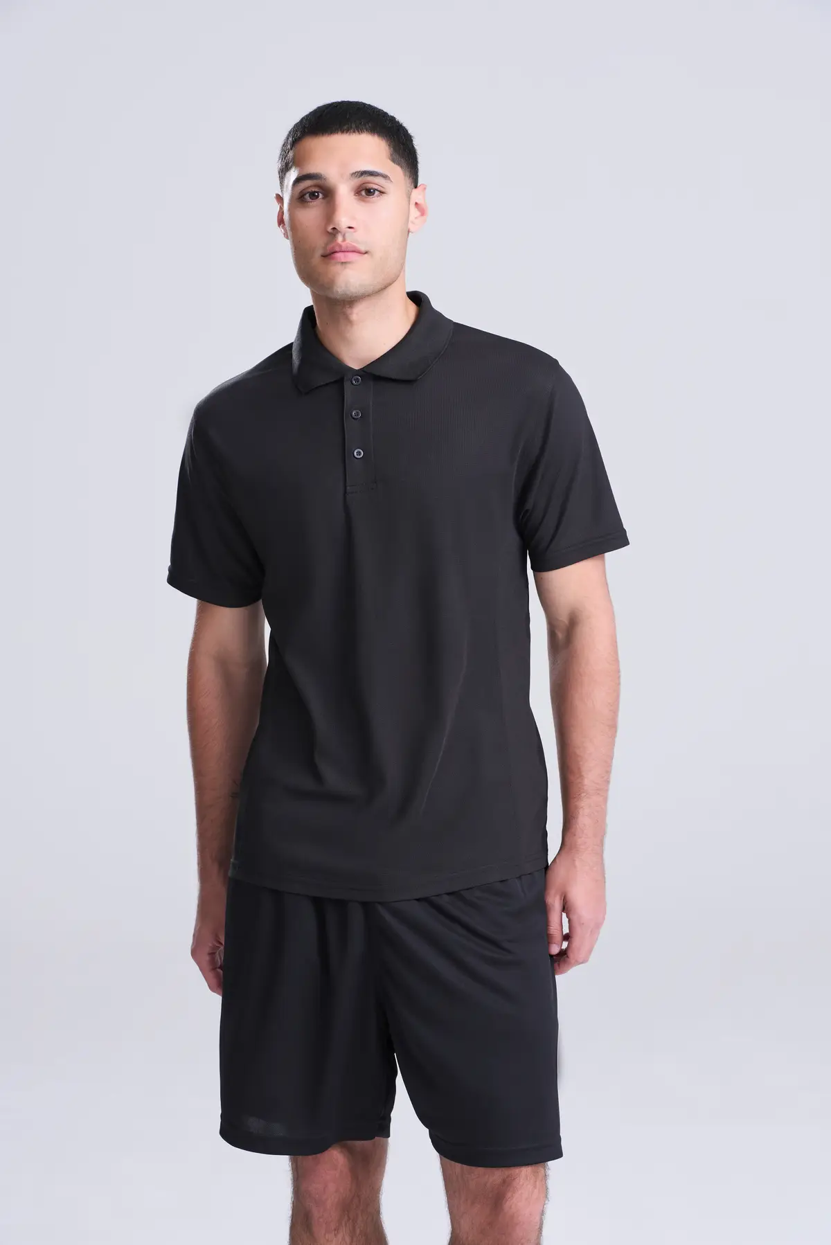 AWDis Just Cool SuperCool performance polo – Jet Black – Original on-model photograph 02