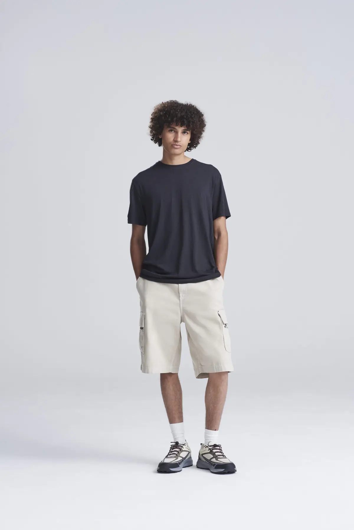 AWDis Just T's Triblend T – Heather Black – AWDis original on-model photograph