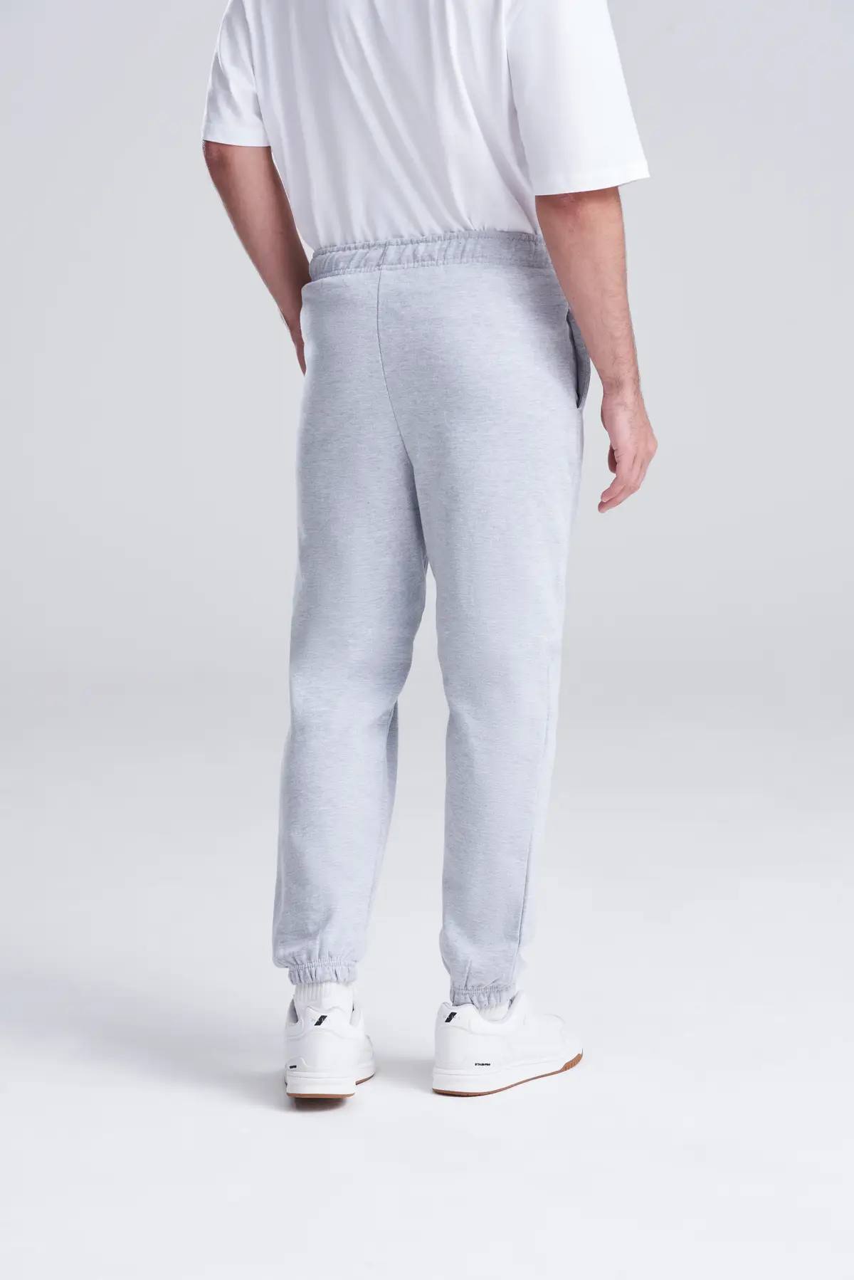 AWDis Just Hoods College cuffed sweatpants – Heather Grey – Original on-model photograph 04
