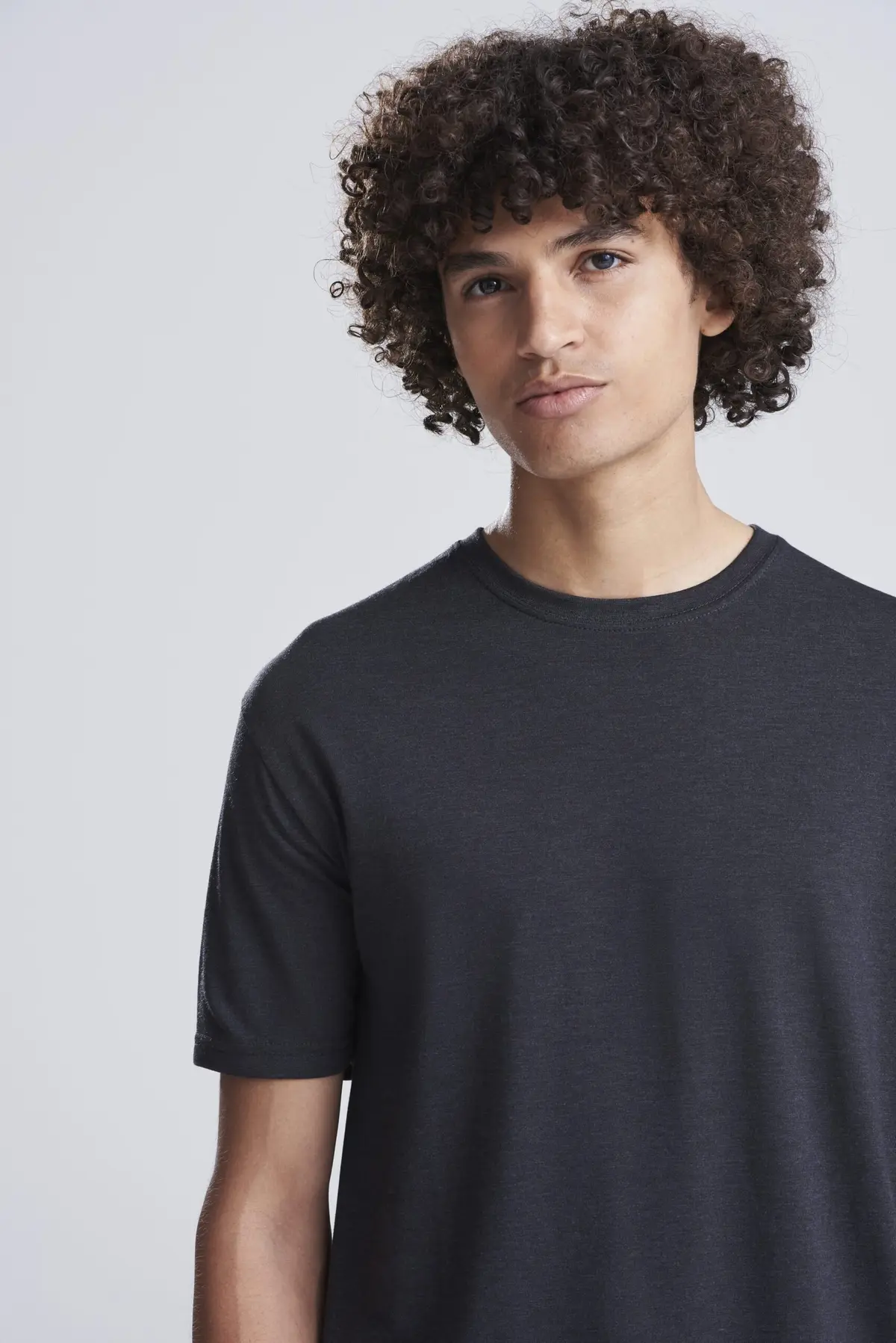 AWDis Just T's Triblend T – Heather Black – AWDis original on-model photograph