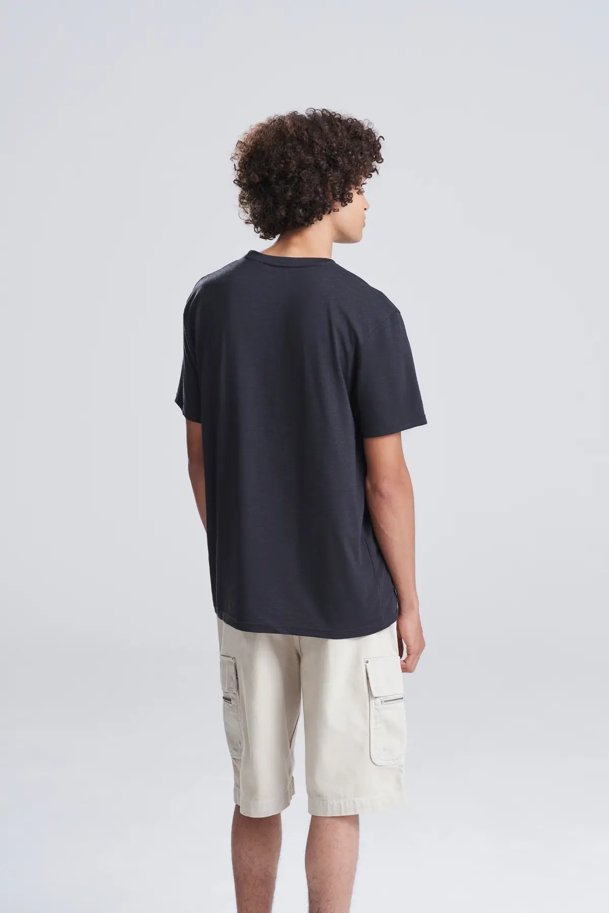 AWDis Just T's Triblend T – Heather Black – Original on-model photograph 03