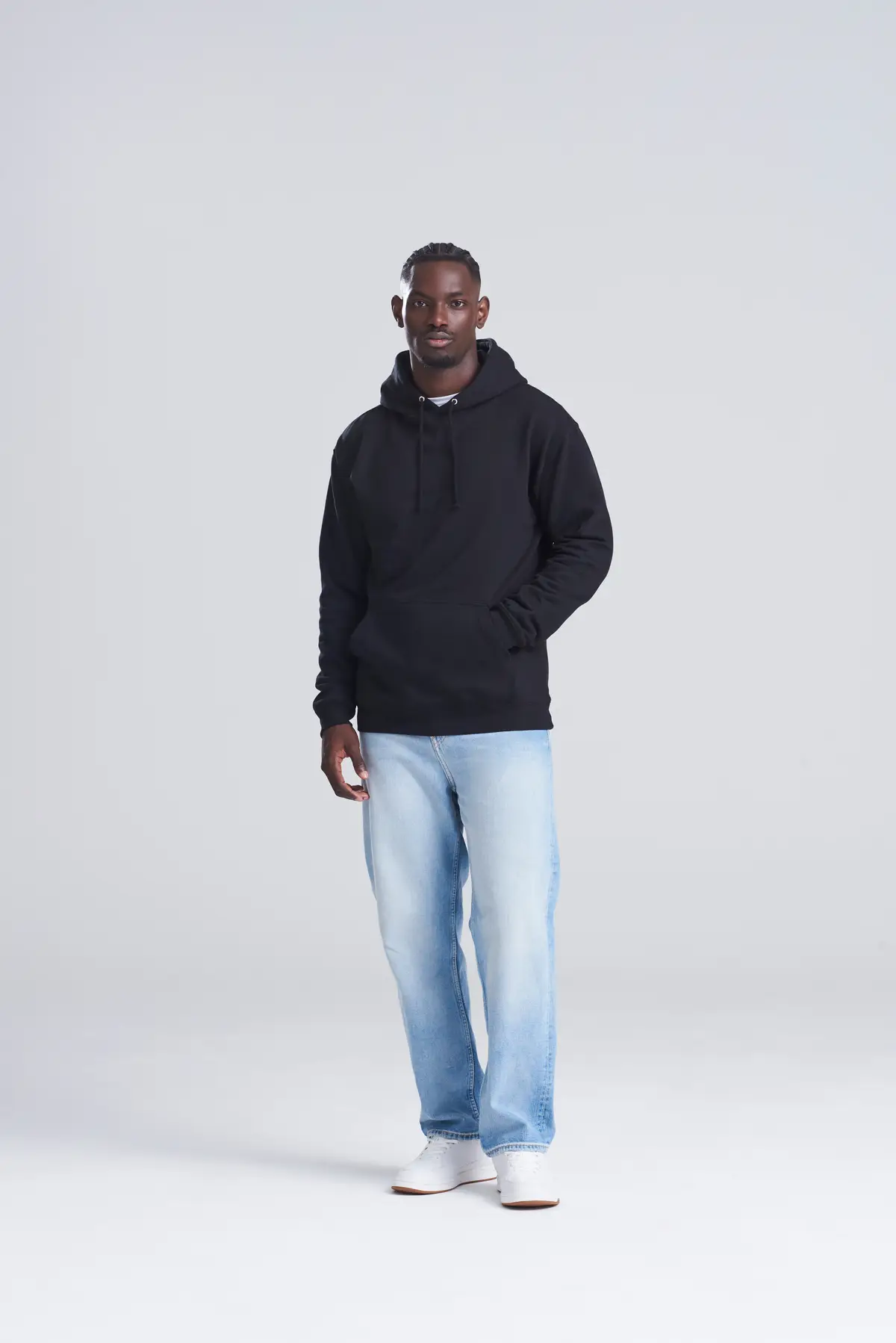 AWDis College Hoodie – Deep Black – Original on-model photograph 01