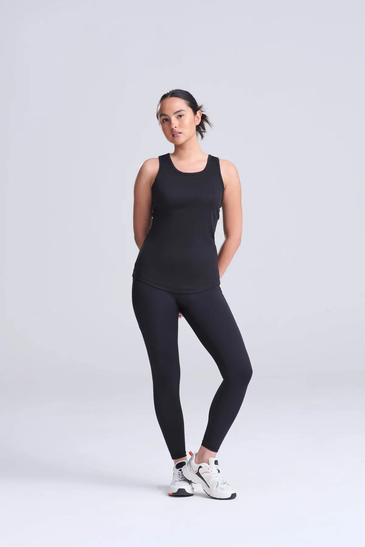 AWDis Just Cool Women's cool vest – Jet Black – AWDis original on-model photograph