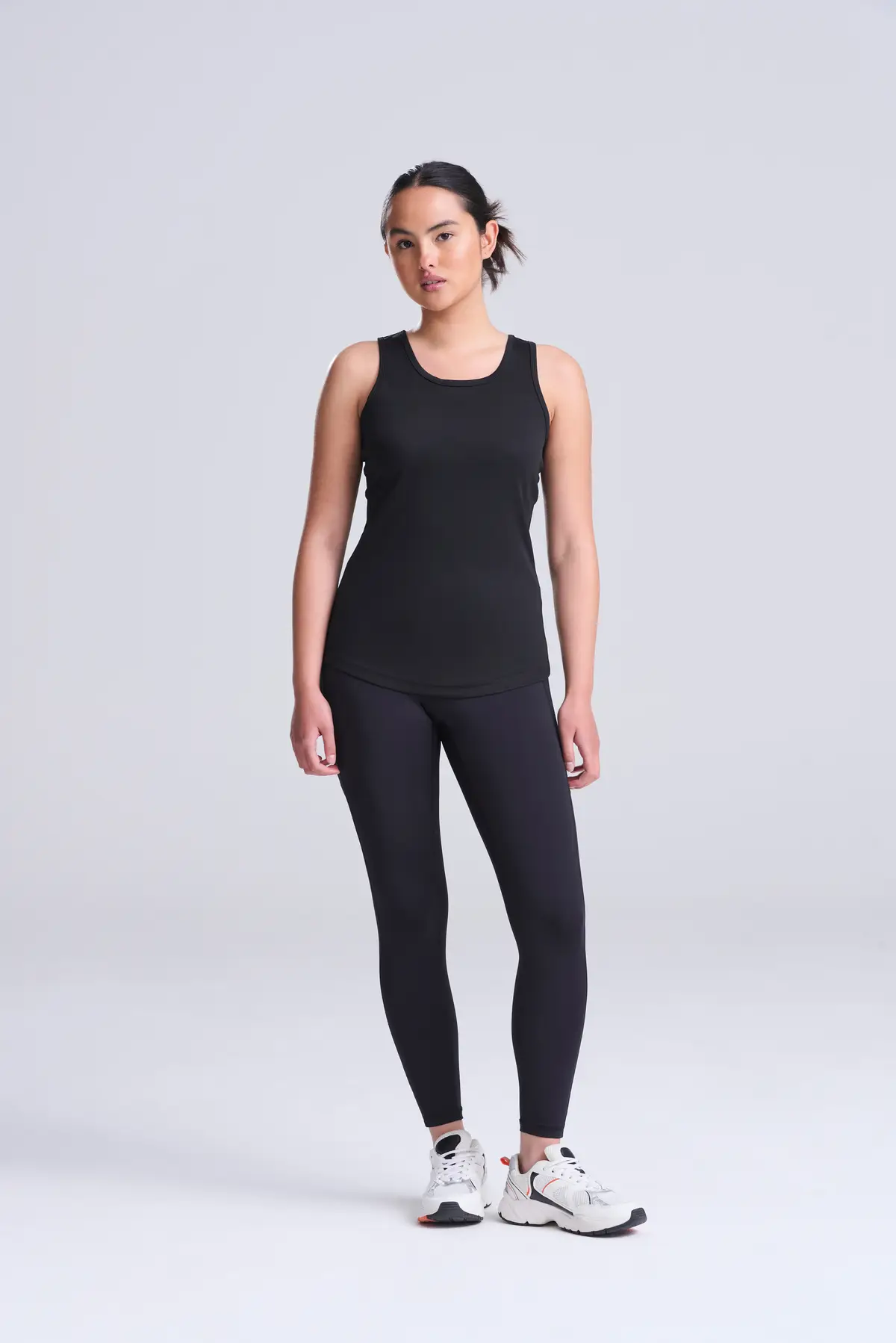 AWDis Just Cool Women's cool vest – Jet Black – Original on-model photograph 00