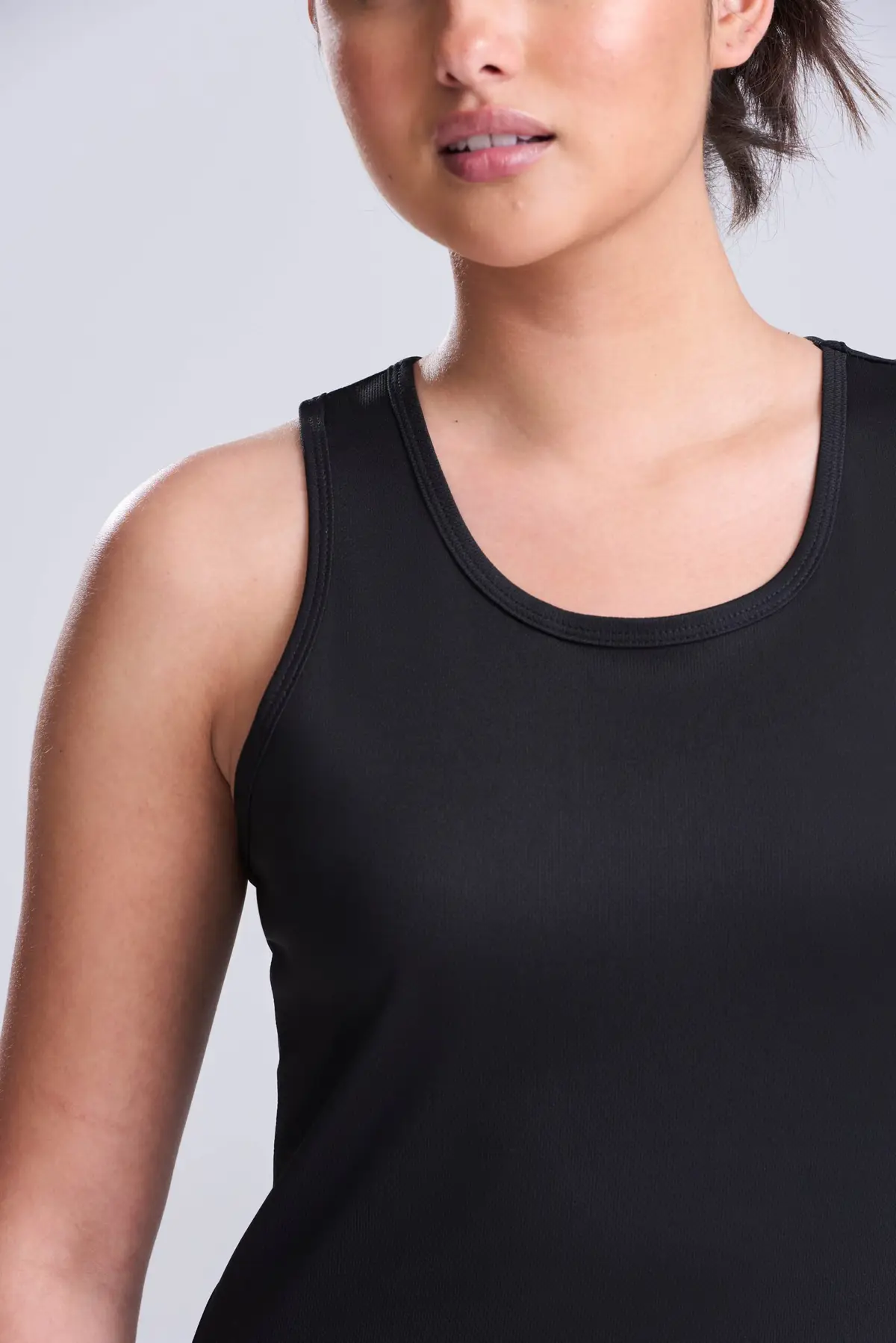 AWDis Just Cool Women's cool vest – Jet Black – AWDis original on-model photograph