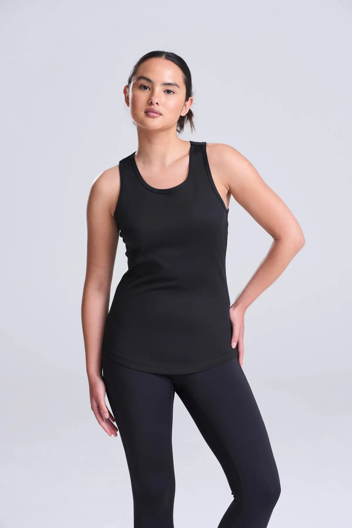 AWDis Just Cool Women's cool vest – Jet Black – AWDis original on-model photograph