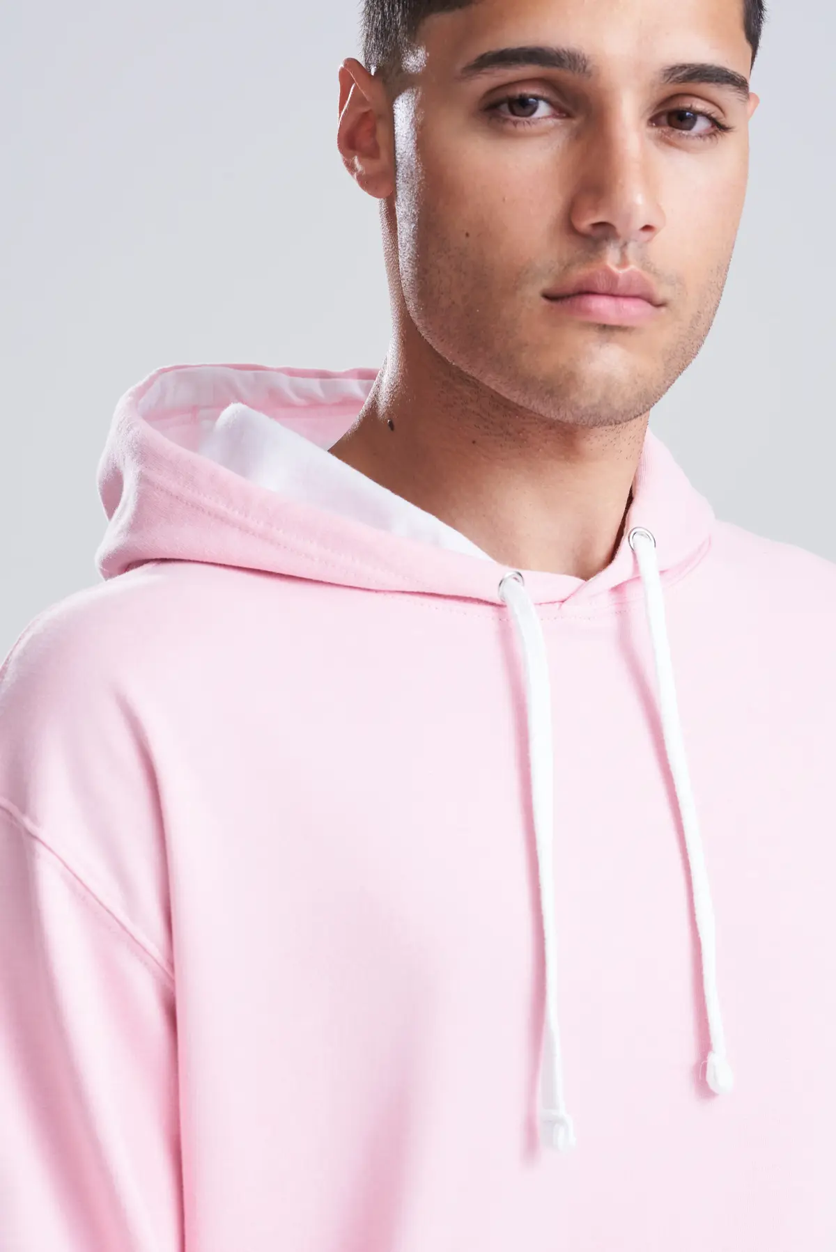 AWDis Just Hoods Varsity hoodie – Baby Pink/Arctic White – Original on-model photograph 41