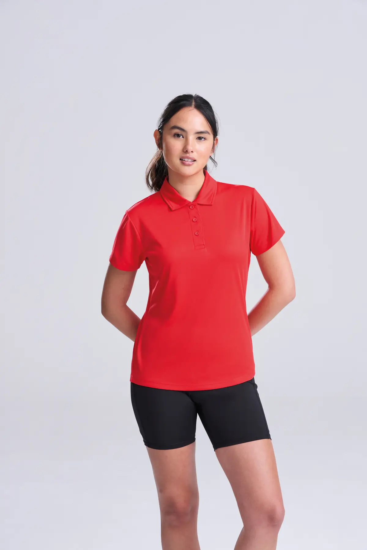 AWDis Just Cool Women's cool polo – Fire Red – Original on-model photograph 02