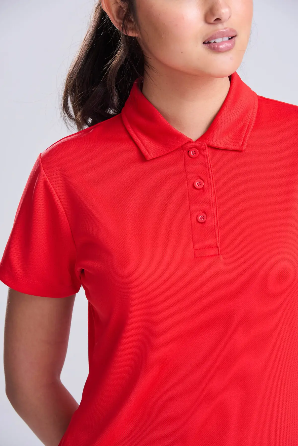 AWDis Just Cool Women's cool polo – Fire Red – AWDis original on-model photograph