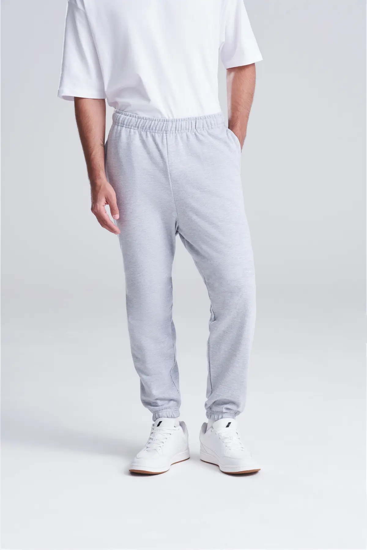 AWDis Just Hoods College cuffed sweatpants – Heather Grey – Original on-model photograph 02