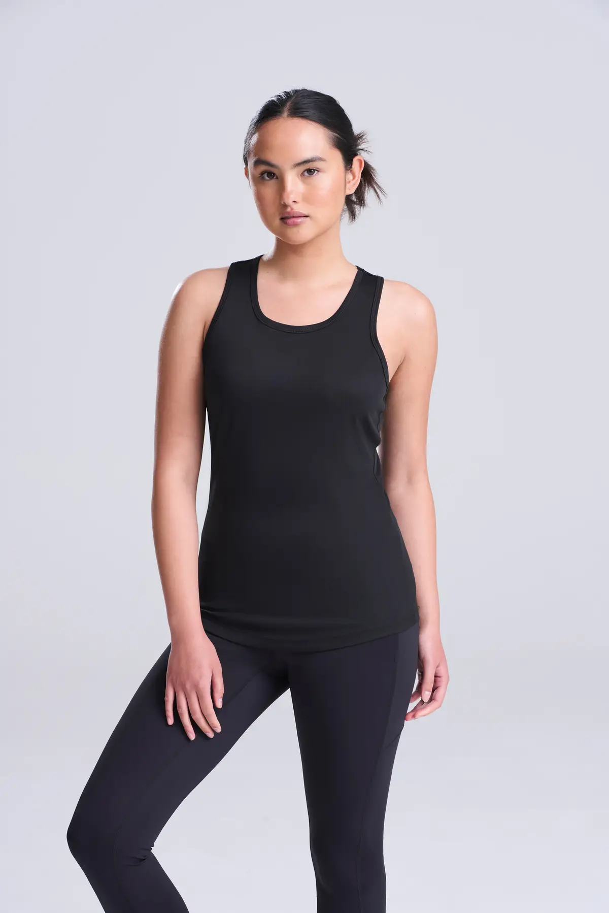 AWDis Just Cool Women's cool vest – Jet Black – Original on-model photograph 03
