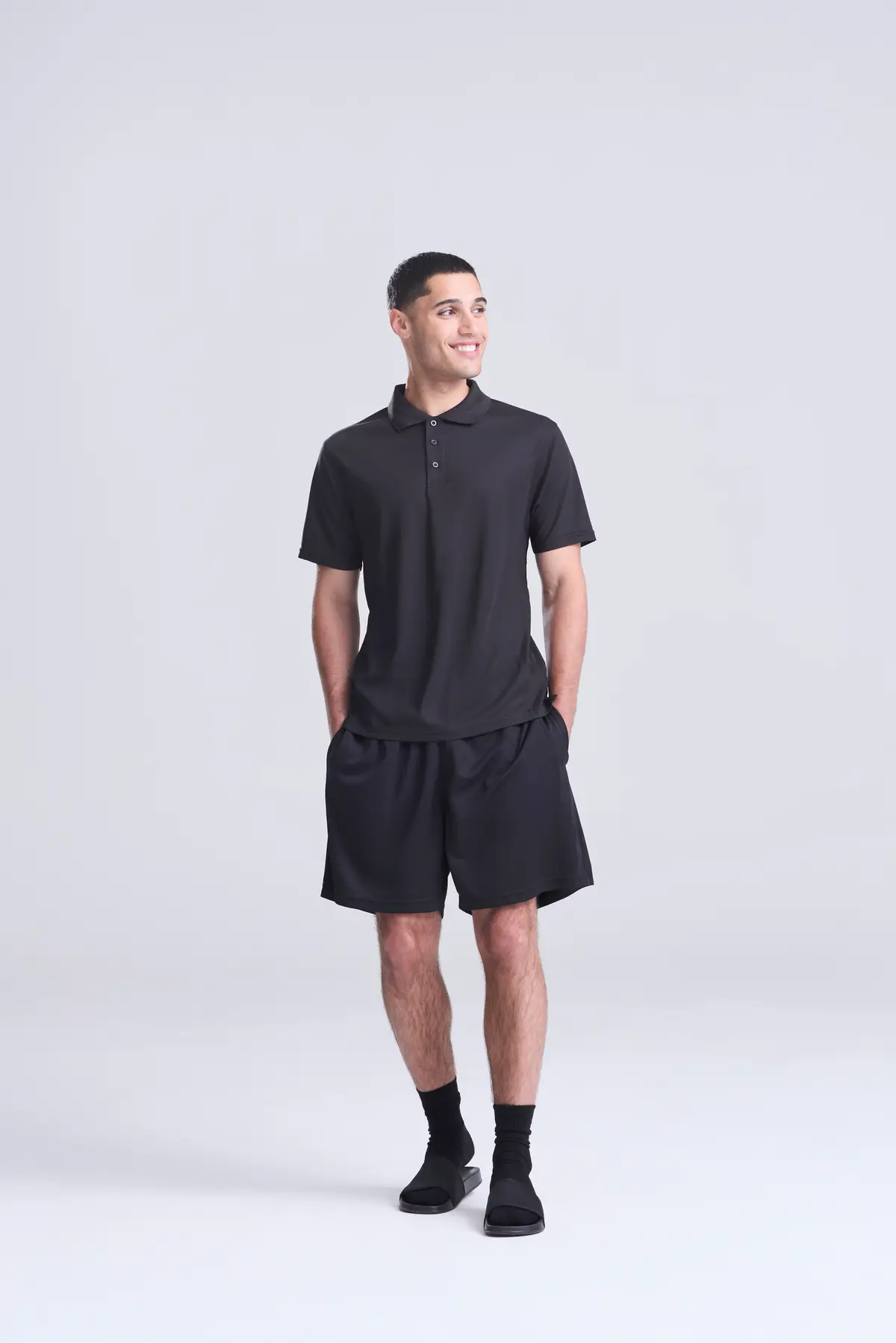 AWDis Just Cool SuperCool performance polo – Jet Black – Original on-model photograph 00