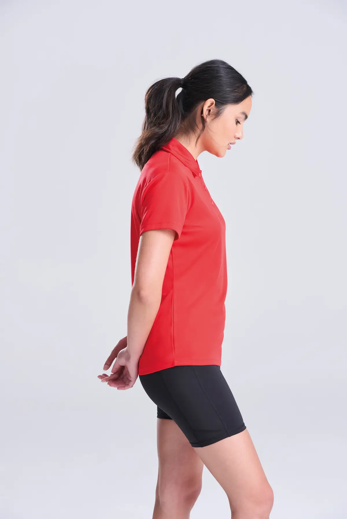AWDis Just Cool Women's cool polo – Fire Red – Original on-model photograph 03