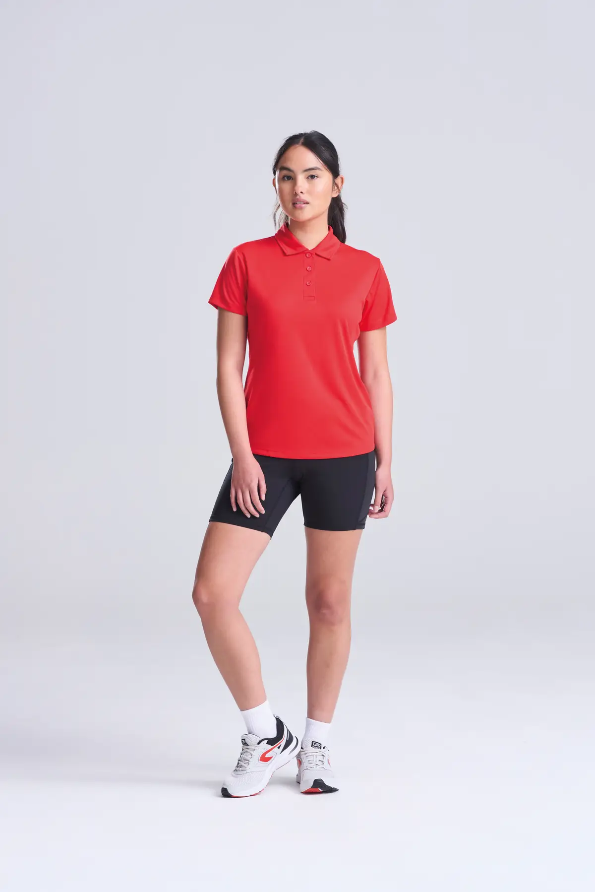 AWDis Just Cool Women's cool polo – Fire Red – Original on-model photograph 00
