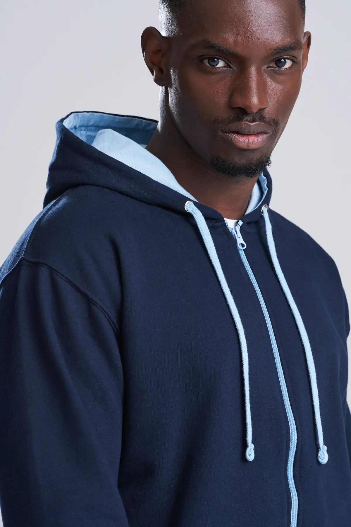 AWDis Just Hoods Varsity zoodie – New French Navy/Sky Blue – Original on-model photograph 40