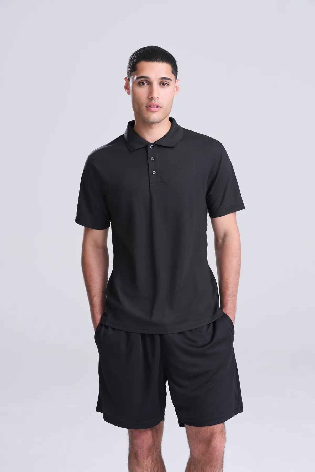 AWDis Just Cool SuperCool performance polo – Jet Black – Original on-model photograph 03