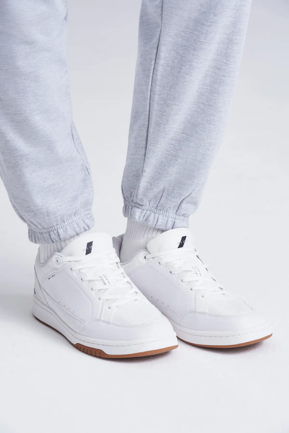 AWDis Just Hoods College cuffed sweatpants – Heather Grey – Original on-model photograph 40