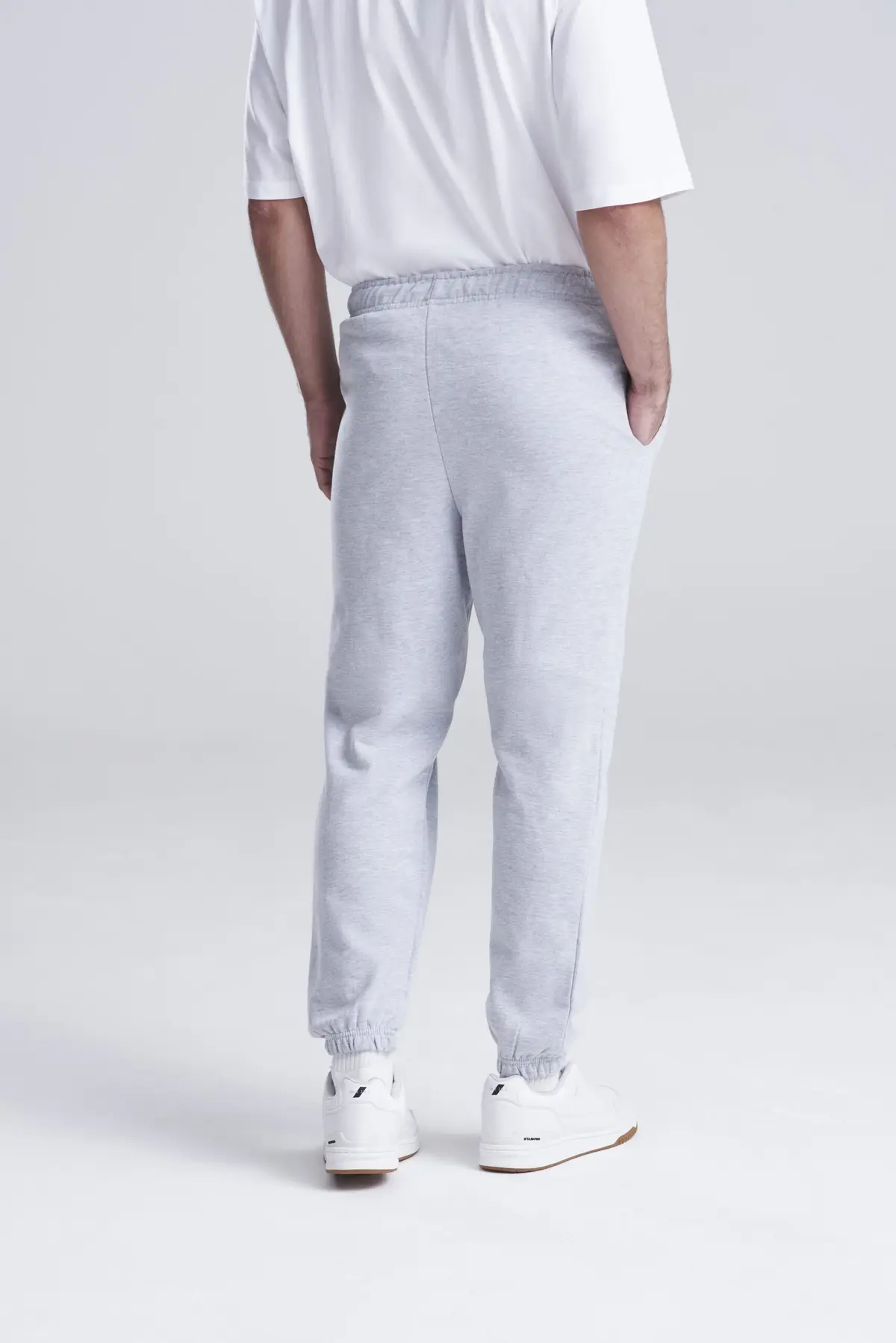 AWDis Just Hoods College cuffed sweatpants – Heather Grey – AWDis original on-model photograph