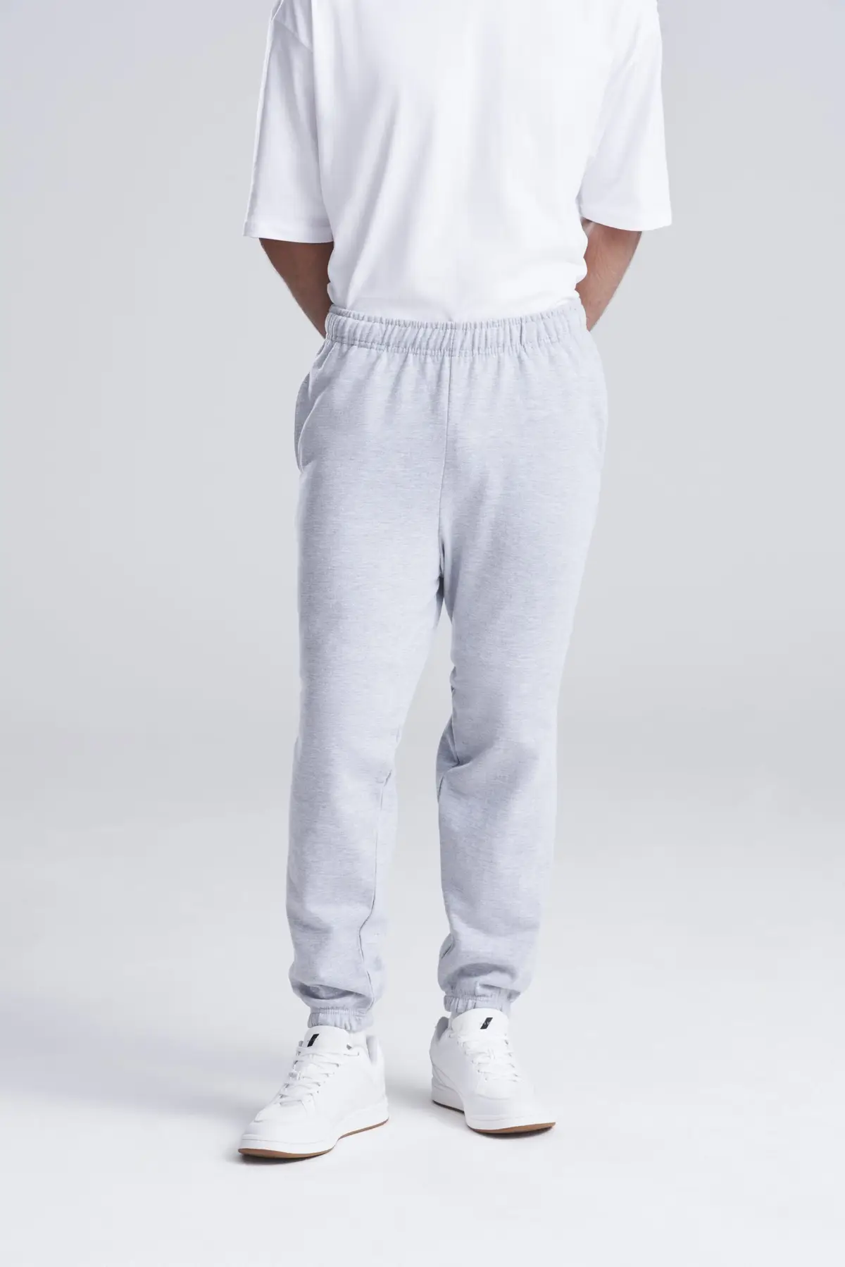 AWDis Just Hoods College cuffed sweatpants – Heather Grey – AWDis original on-model photograph