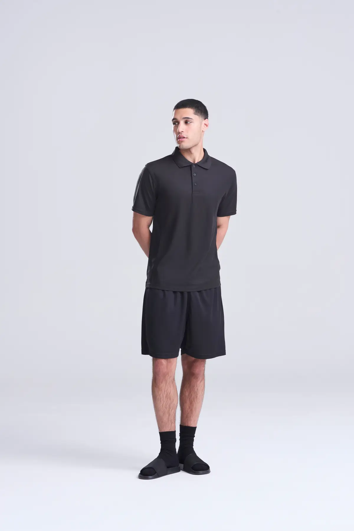 AWDis Just Cool SuperCool performance polo – Jet Black – Original on-model photograph 01