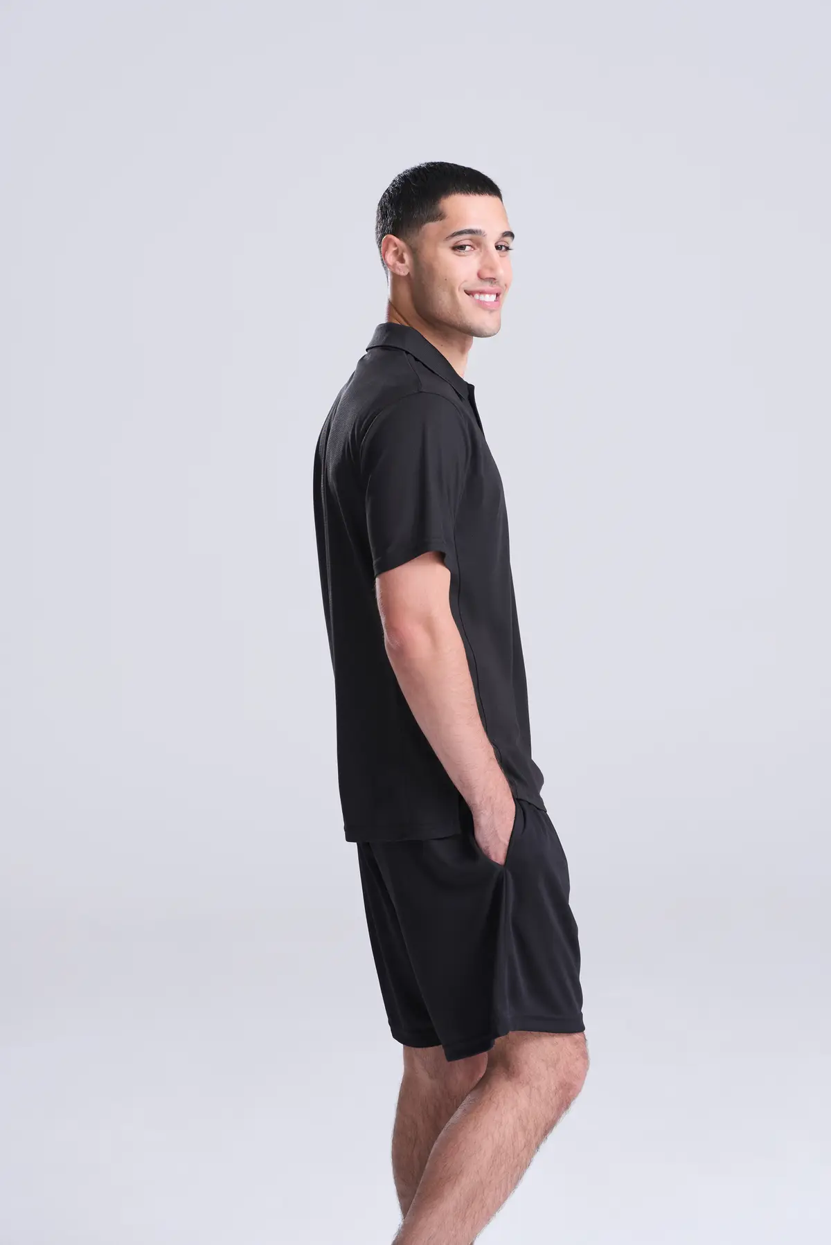 AWDis Just Cool SuperCool performance polo – Jet Black – Original on-model photograph 04